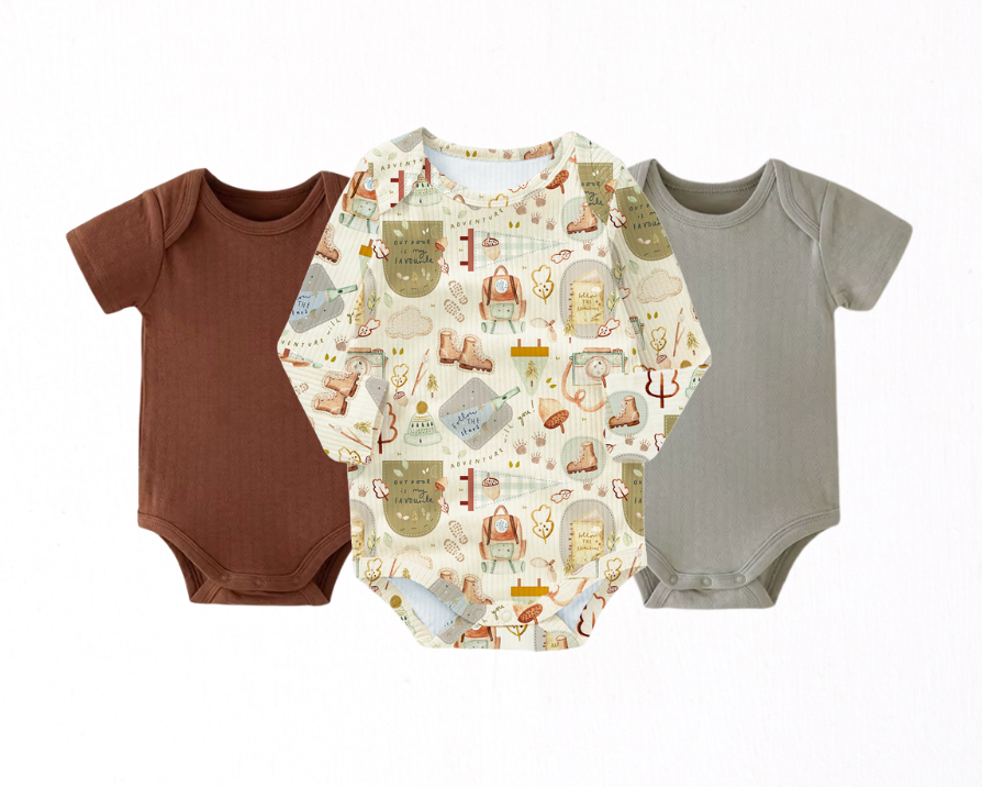Three baby bodysuits in brown, patterned, and gray on a white background with Black Friday sale text.