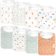 A set of eight baby bibs in soft pastel colors with playful safari and adventure-themed prints, featuring animals, trees, and vehicles, designed for both function and style.