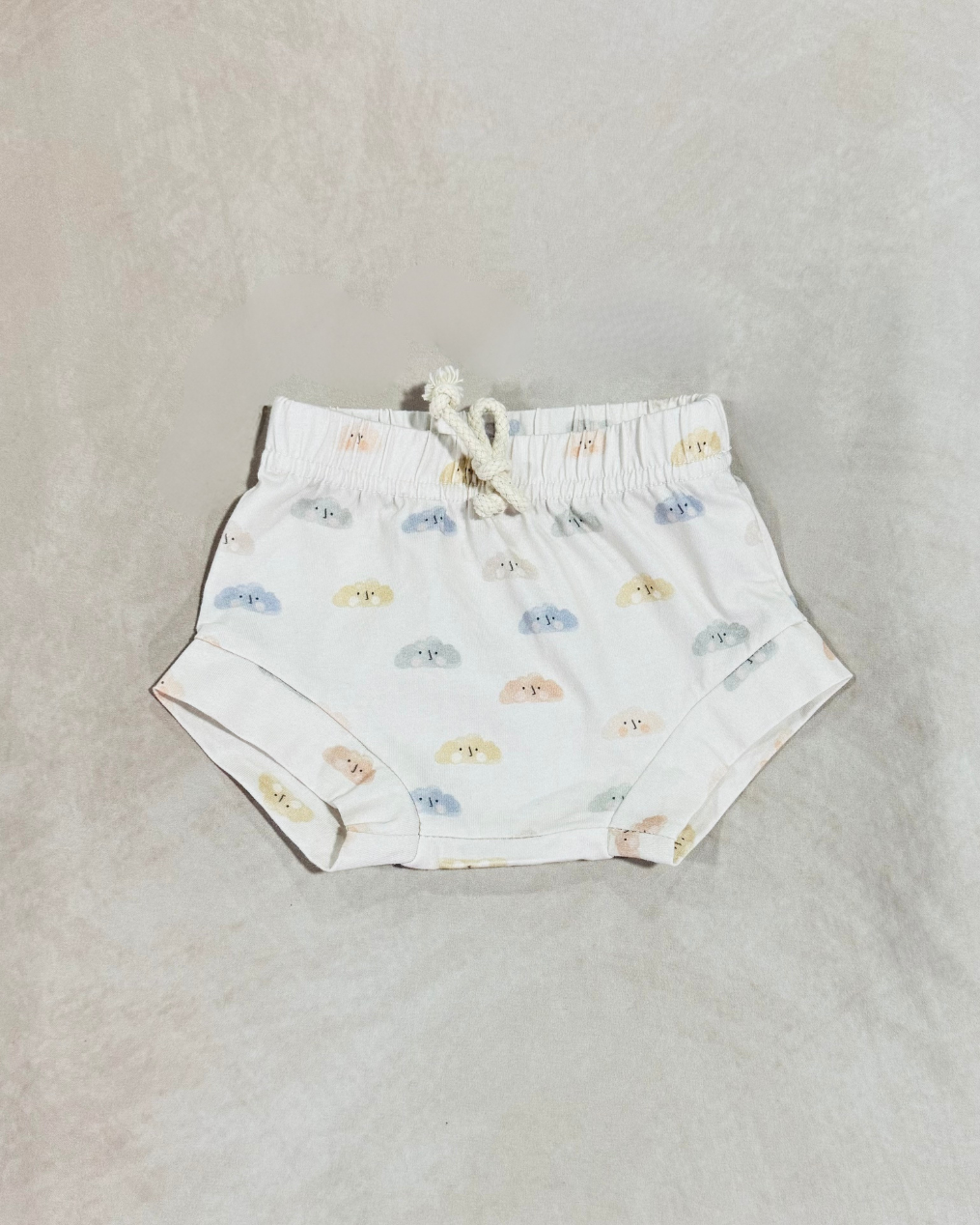 ivory shorts with cloud pattern in pastel colors